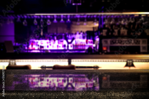 Desk of free space and blurred background of bar  © magdal3na
