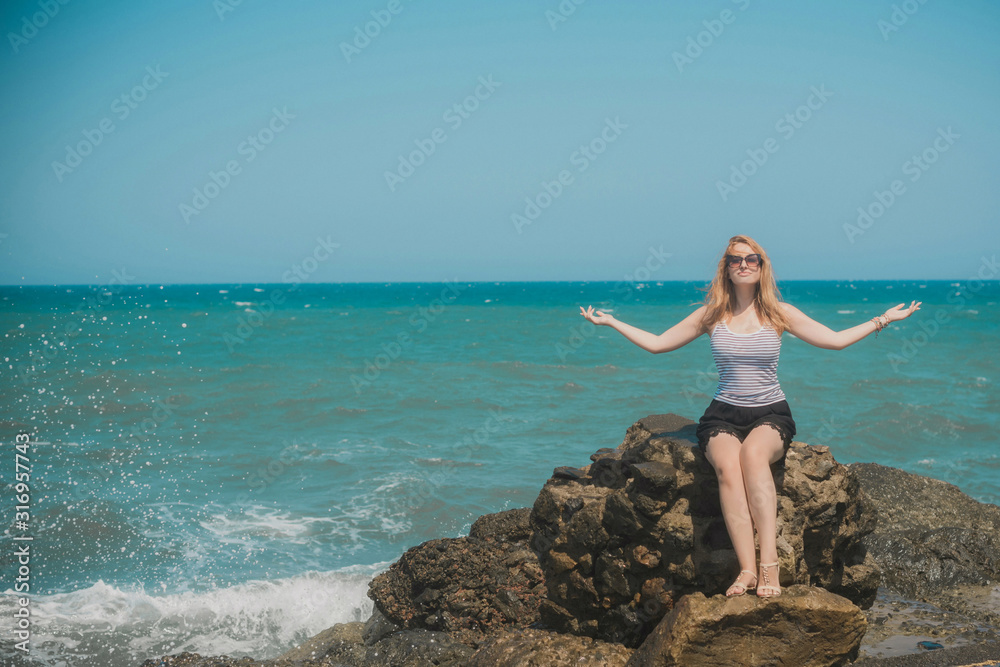 Plus size nice young woman with full hips and pretty figure rest at sea, vacation and trip concept