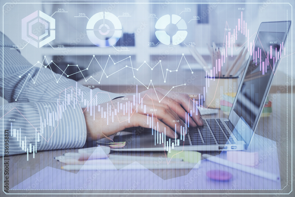 Double exposure of stock market graph with man working on laptop on background. Concept of financial analysis. Double exposure of stock market graph with man working on laptop on background. Concept of financial analysis.