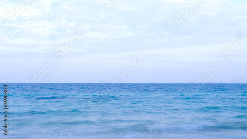 The balance of the sky and the calm blue sea © phungatanee