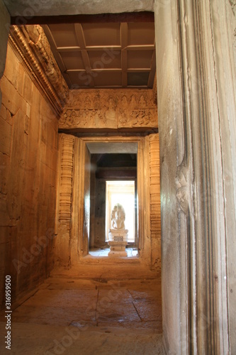 The idol statue inside the main Phimai stone castle. © superbphoto95