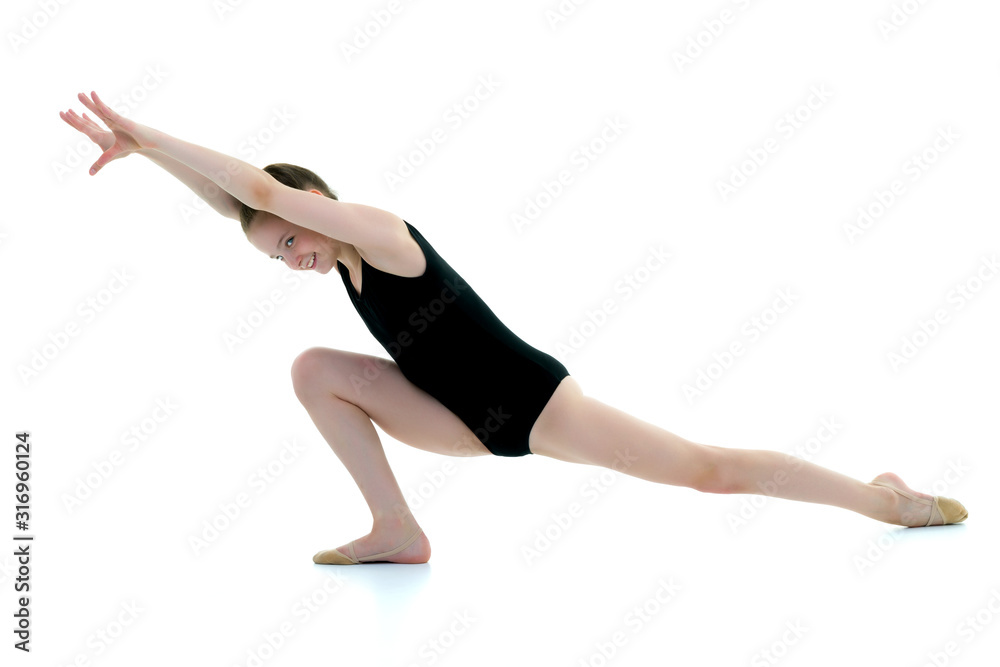 The gymnast perform an acrobatic element on the floor. The gymnast perform an acrobatic element on the floor.