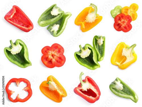 Set of different cut ripe bell peppers on white background, top view