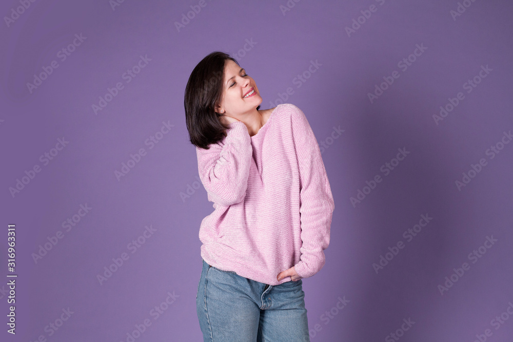 Pretty woman on purple background. Studio shot of beautiful girl Pretty woman on purple background. Studio shot of beautiful girl