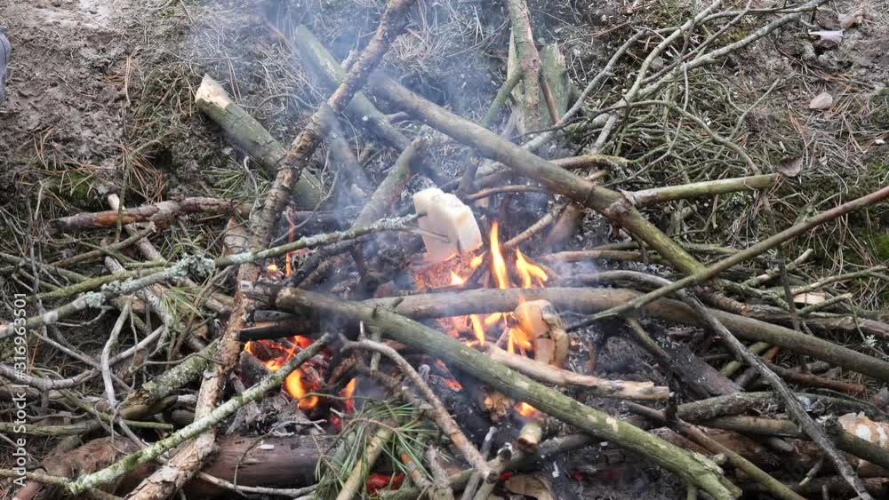 prepare food on a campfire in nature prepare food on a campfire in nature