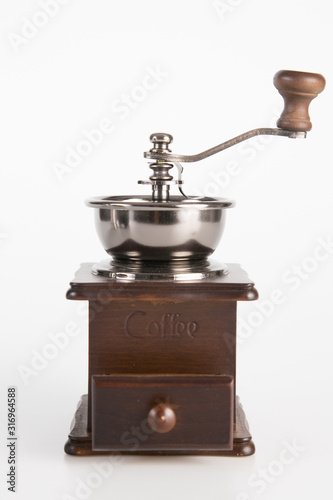 Coffee grinder on the white background