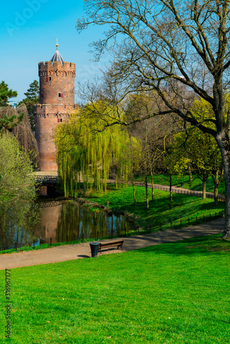 Kronenburgerpark in Nijmegen, The Netherlands. Park with hiking path, tower, water and bridge
