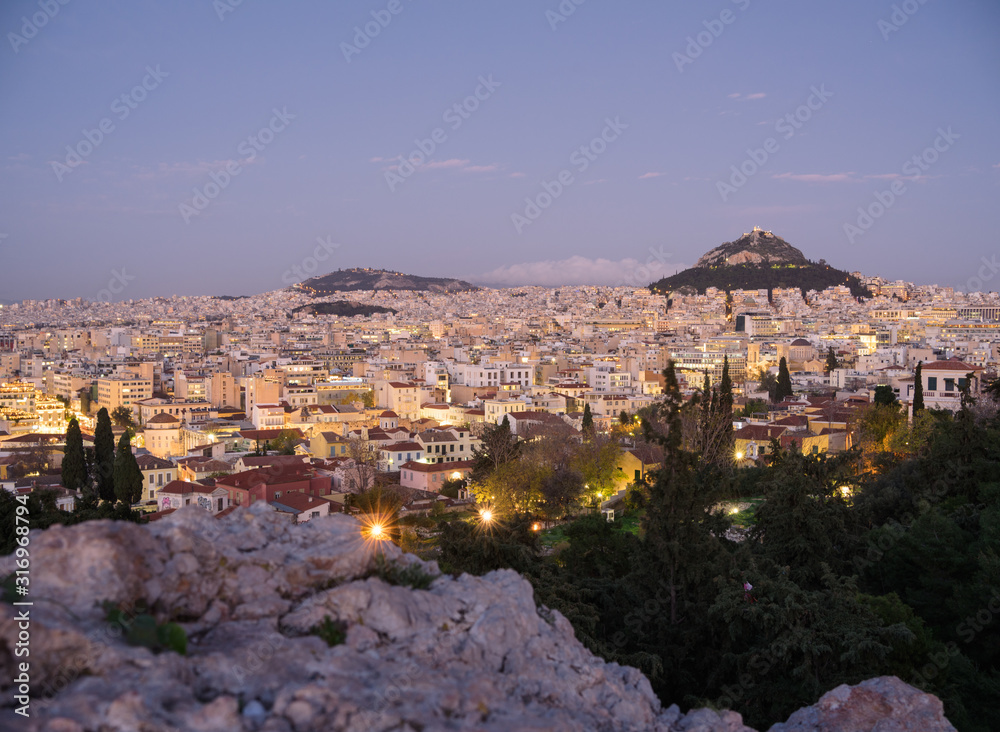 Athens, Greece - Dec 20, 2019: The view from Acropolis to Lykavittos hill and the town