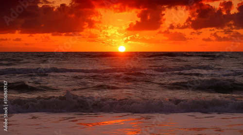 beautiful sunset over the ocean © BVpix