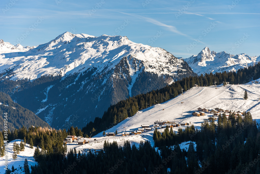 Alpine skiing landscape - Austrian Alps ski resort. Winter sports concept.