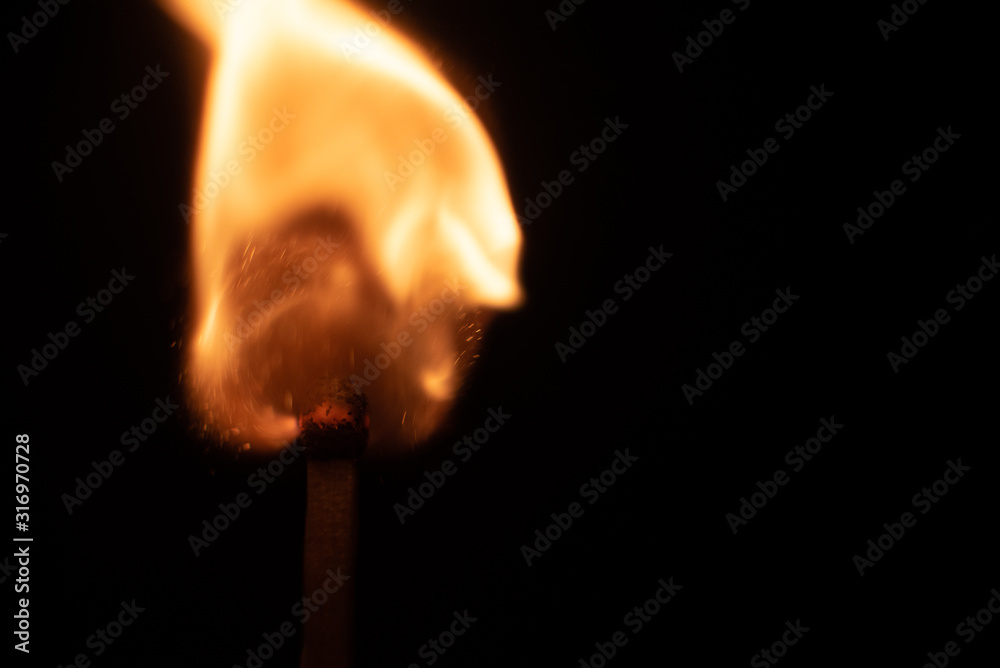 Ignition of match with sparks isolated on black background space for text fire concept passion figures variety Ignition of match with sparks isolated on black background space for text fire concept passion figures variety
