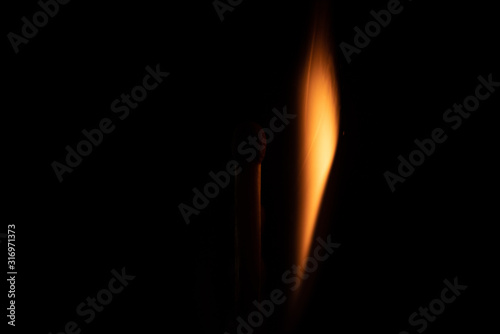 Ignition of match with sparks isolated on black background space for text fire concept passion figures variety