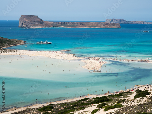A day on the cruise ship to balos lagoon and Gramvousa island setting sail fron chania on the greek island of crete photo