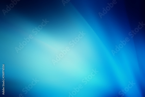Blue abstract background with rays of light, northern lights, night sky