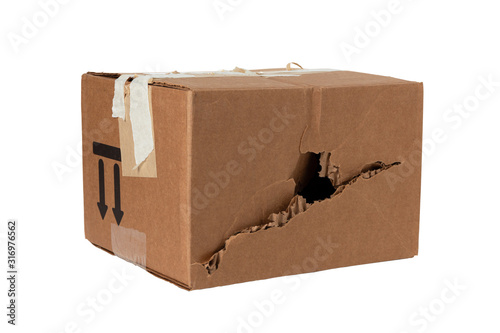 Damaged crumpled postal cardboard