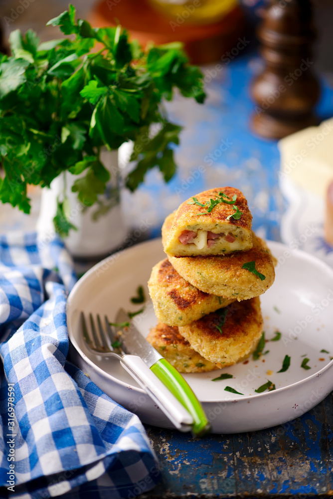potato patties with mortadella and mozzarella.style rustic potato patties with mortadella and mozzarella.style rustic