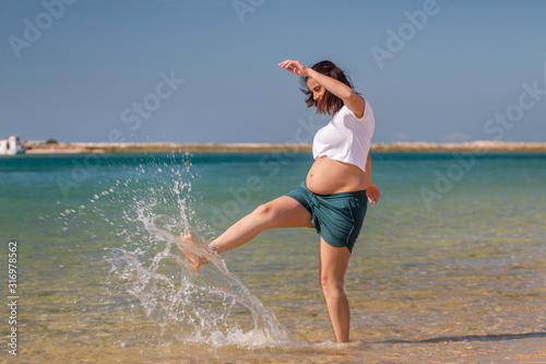 Pregnant woman having fun