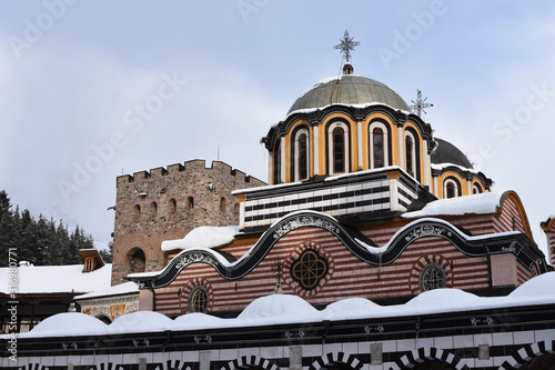 Covered by snow dome of Rila Monastery - the biggest Eastern Orthodox monastery in Bulgaria photo