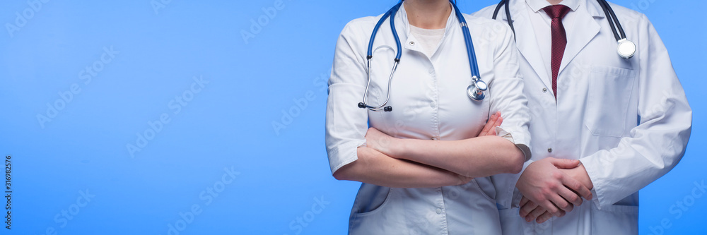Medical Staff Doctor, nurse and surgeon With Stethoscope and tie in blue background Medical Staff Doctor, nurse and surgeon With Stethoscope and tie in blue background