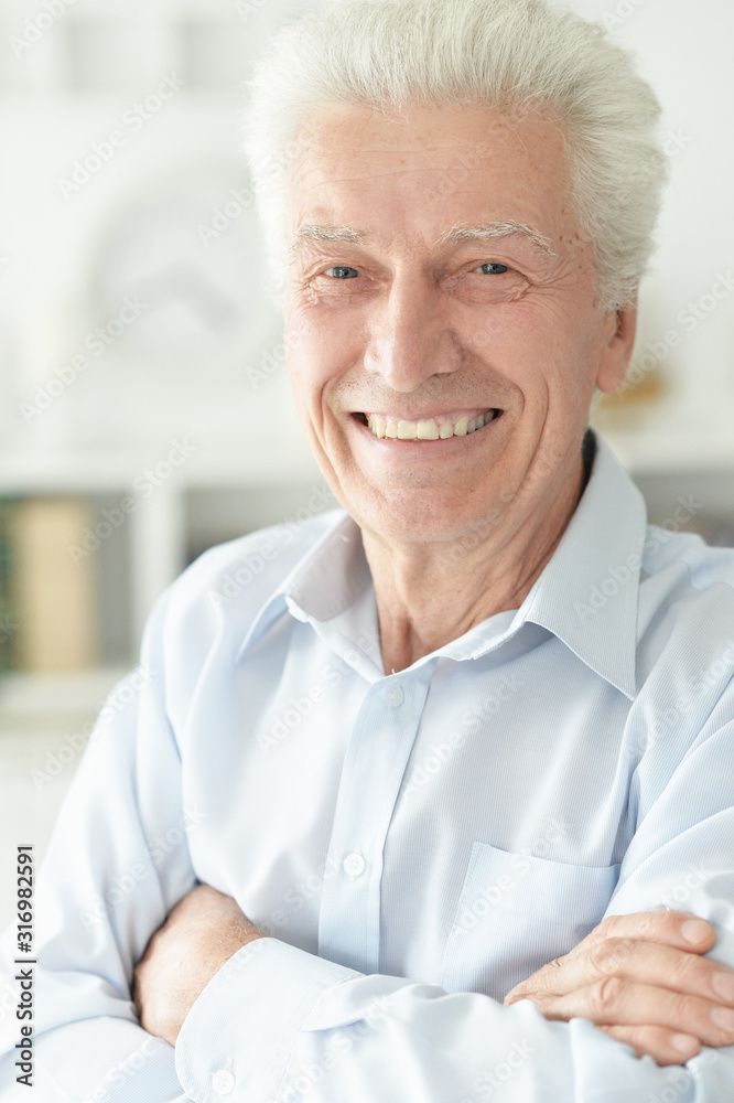 Portrait of happy senior man at home Portrait of happy senior man at home