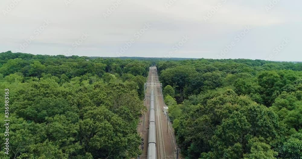 Aerial Forward Dolly Shot Passing Over Speeding Train at Dawn Aerial Forward Dolly Shot Passing Over Speeding Train at Dawn