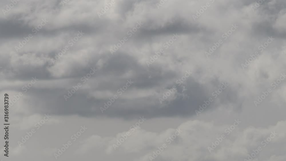 Time-lapse of backlit summer clouds moving through the sky in South Australia Time-lapse of backlit summer clouds moving through the sky in South Australia