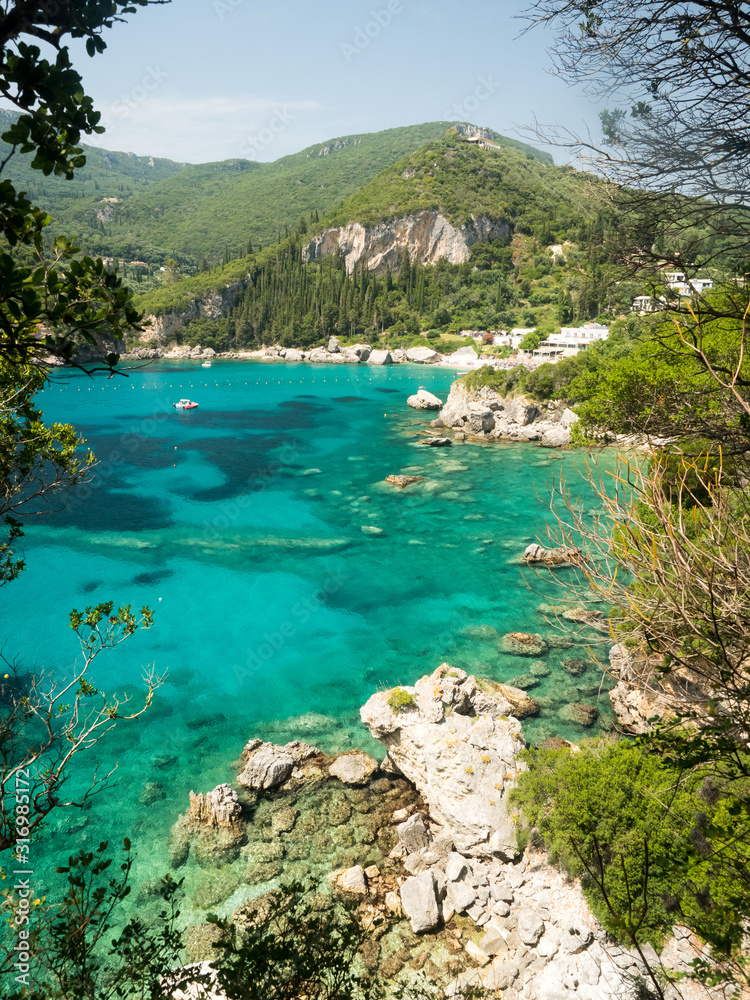 Wandering paleokastritsa on the greek island of corfu during a golden summer afternoon.