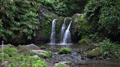 'Cascata da Ribeira Caldeiroes' waterfall. Azores, Portugal.  photo