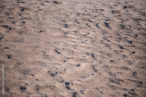 Defocus abstract background sand. Sandy beach on tropical resort
