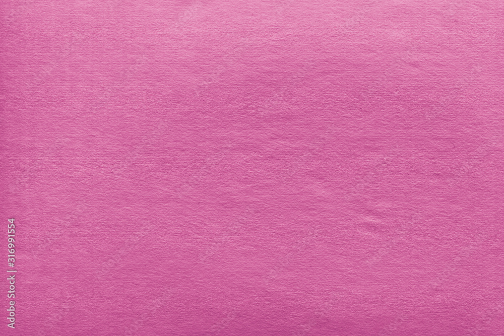 Fototapeta premium Cardboard pink abstract pattern texture close-up. Retro old paper background. Grunge concrete wall. Vintage blank wallpaper.