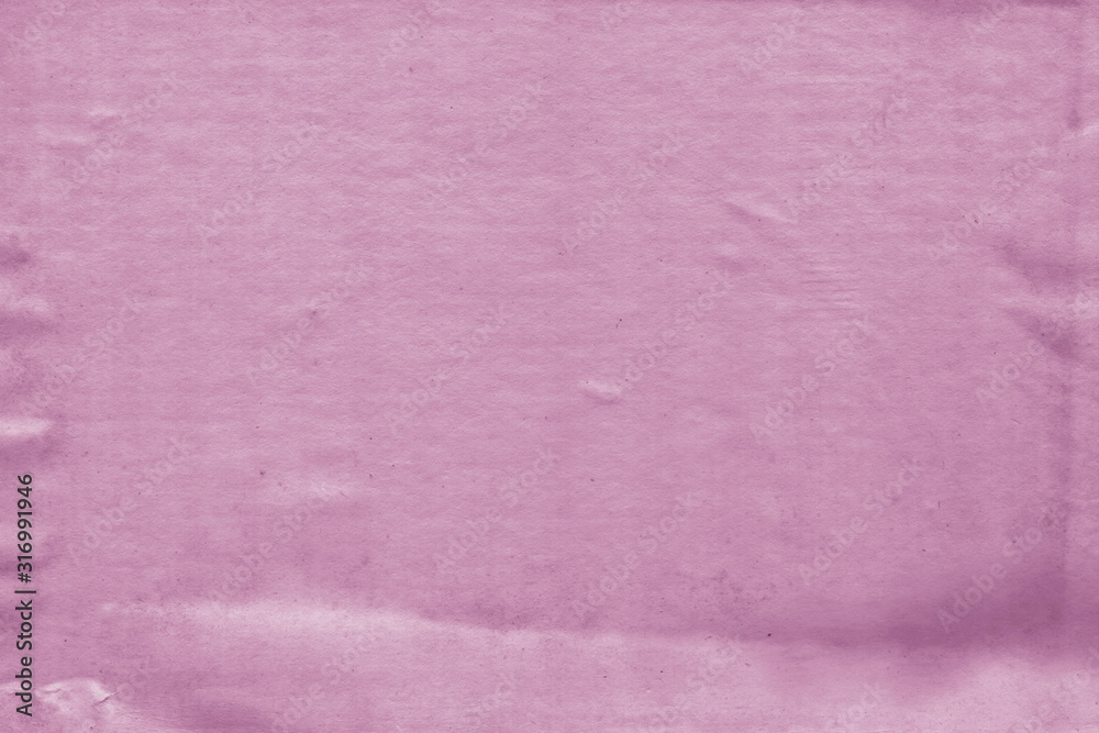 Fototapeta premium Cardboard pink abstract pattern texture close-up. Retro old paper background. Grunge concrete wall. Vintage blank wallpaper.