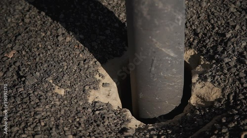 Wallpaper Mural Drilling equipment working on production site of gas factory in sun day. Iron tool of gasoline rig work and drill hole during mining process in oil plant. Concept: business, technology, environment. Torontodigital.ca