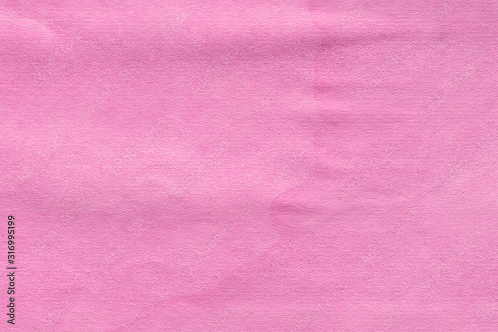 Fototapeta premium Cardboard pink abstract pattern texture close-up. Retro old paper background. Grunge concrete wall. Vintage blank wallpaper.