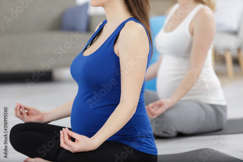 pregnant women in yoga class