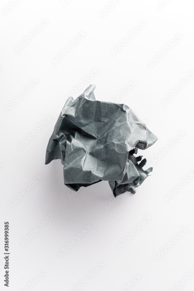 crumpled ball of gray paper on a white background crumpled ball of gray paper on a white background