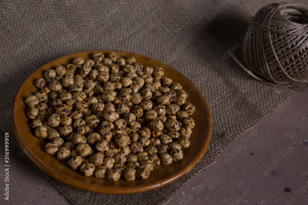 roasted chickpeas in brown bowl roasted chickpeas in brown bowl