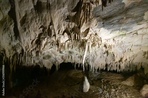 Moravian Karst. Stalactites, stalagmites and streak formations in cave of Balzarca. Czech Republic photo