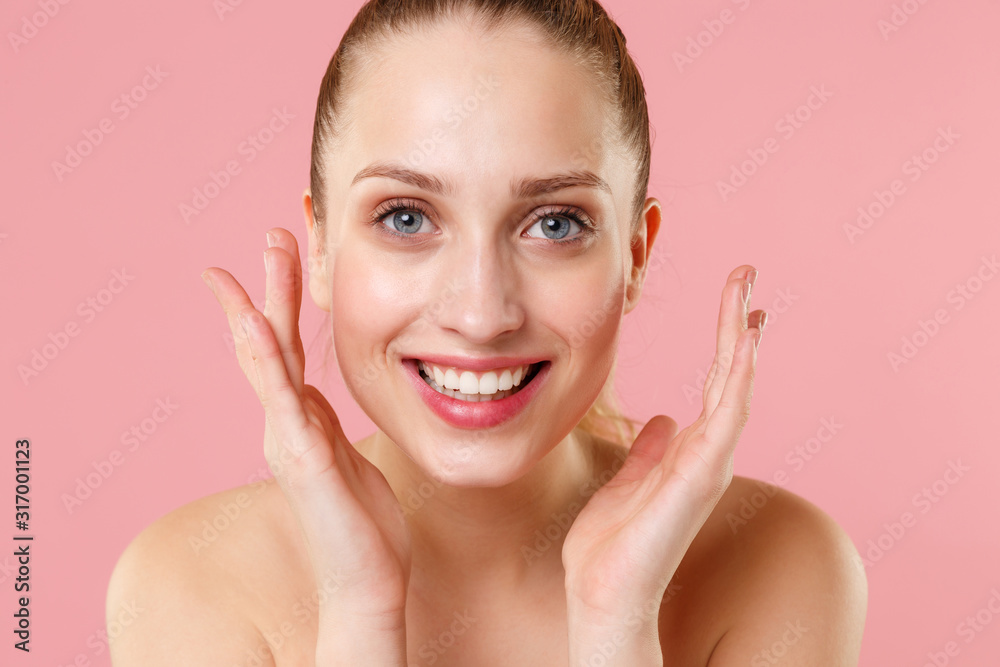 Close up blonde half naked woman 20s perfect skin nude make up blue eyes isolated on pastel pink wall background studio portrait. Skin care healthcare cosmetic procedures concept. Mock up copy space. Close up blonde half naked woman 20s perfect skin nude make up blue eyes isolated on pastel pink wall background studio portrait. Skin care healthcare cosmetic procedures concept. Mock up copy space.