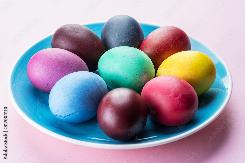 Colorful Easter eggs as an attribute of Easter celebration. Pink background. Colorful Easter eggs as an attribute of Easter celebration. Pink background.