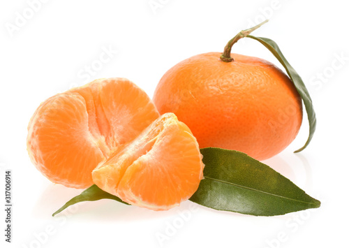 Mandarin in group with peeled fruits isolated on white