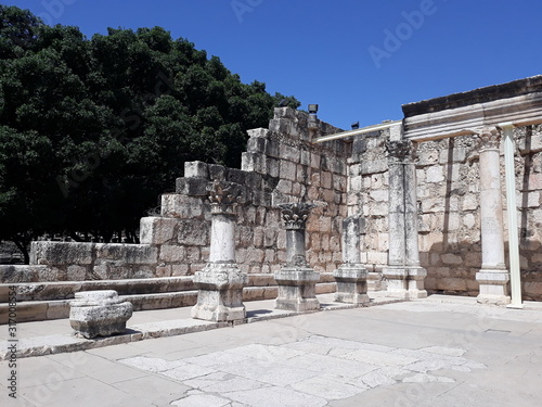 The ruins of the 4th-century old synagogue in Capernaum, where Jesus made His home during His ministry. photo