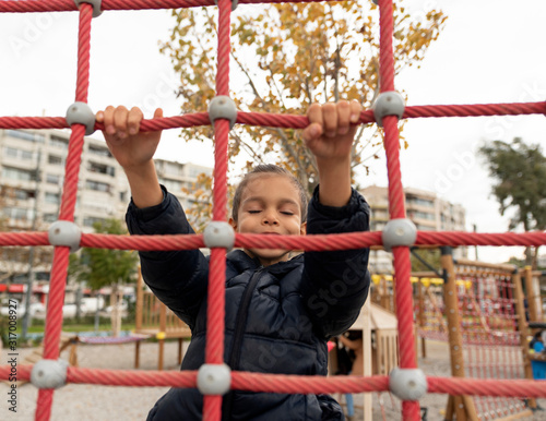 Kid playing at the playground  © Aylin