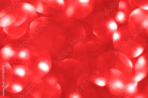 Red bokeh background. Concept of New Year, Christmas, Valentines, and All Celebrations.  photo