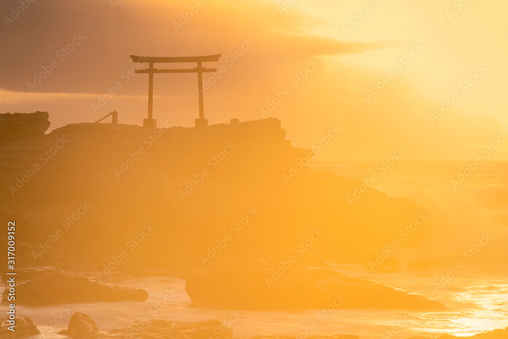 Long exposure morning view of torii gate in the sea at Shirahama shrine, Izu Peninsula, Japan Long exposure morning view of torii gate in the sea at Shirahama shrine, Izu Peninsula, Japan