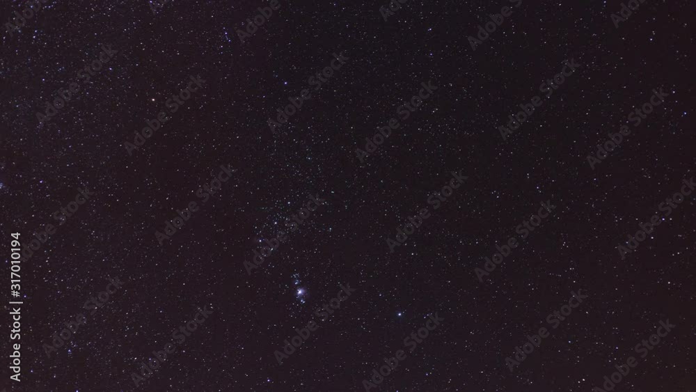 4K video time lapse of constellation Orion with visible stars Betelgeuse and Rigel. Orion nebula and flame nebula and Rosette nebula. Messier 42 and Alnitak,  Alnilam, Mintaka star