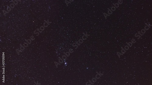 4K video time lapse of constellation Orion with visible stars Betelgeuse and Rigel. Orion nebula and flame nebula and Rosette nebula. Messier 42 and Alnitak,  Alnilam, Mintaka star photo