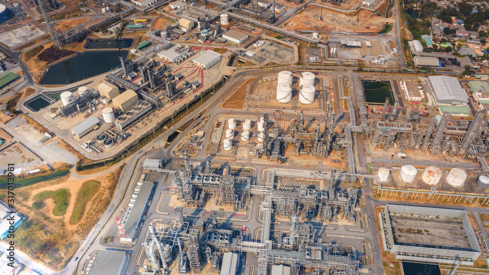 Top view oil refinery industry zone, Industrial manufacturing petrochemical,  Refinery plant in the daytime.