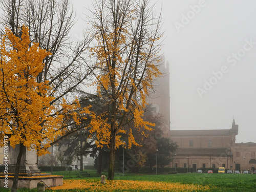 Ferrara  Italy. Autumn  foggy day. The basilica of San Giorgio fuori le Mura.