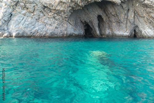 Photos Sea caves on blue water near Ponza, in the Italian Mediterranea sea