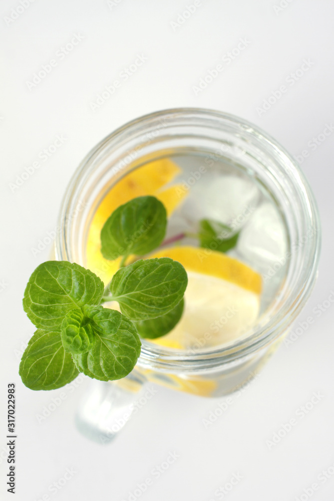 Fototapeta premium Glass of water, lemon and mint. Detox